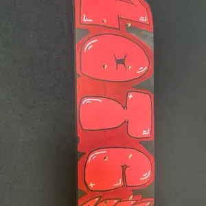 1 OTC ROMAN REIGNS SKATEBOARD