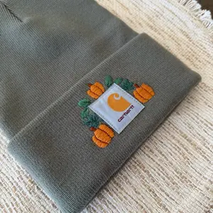 Carhartt Pumpkin Beanie in Sage Green with Embroidered Pumpkins and Leaves for Fall Season
