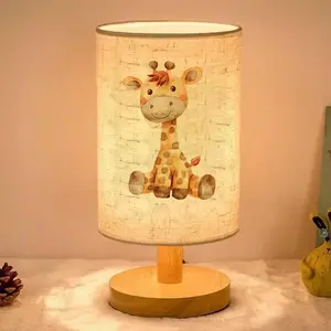 This ambient table lamp features a watercolor cartoon giraffe design, is USB powered, and is suitable for bedroom and living room decoration. It makes an excellent gift for family and friends during holidays such as Valentine's Day and Christmas