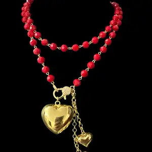 Elegant Red Beaded Necklace with Gold Heart Pendant and Matching Heart Charms for Women