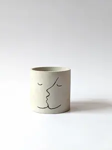 The Kiss Concrete Planter