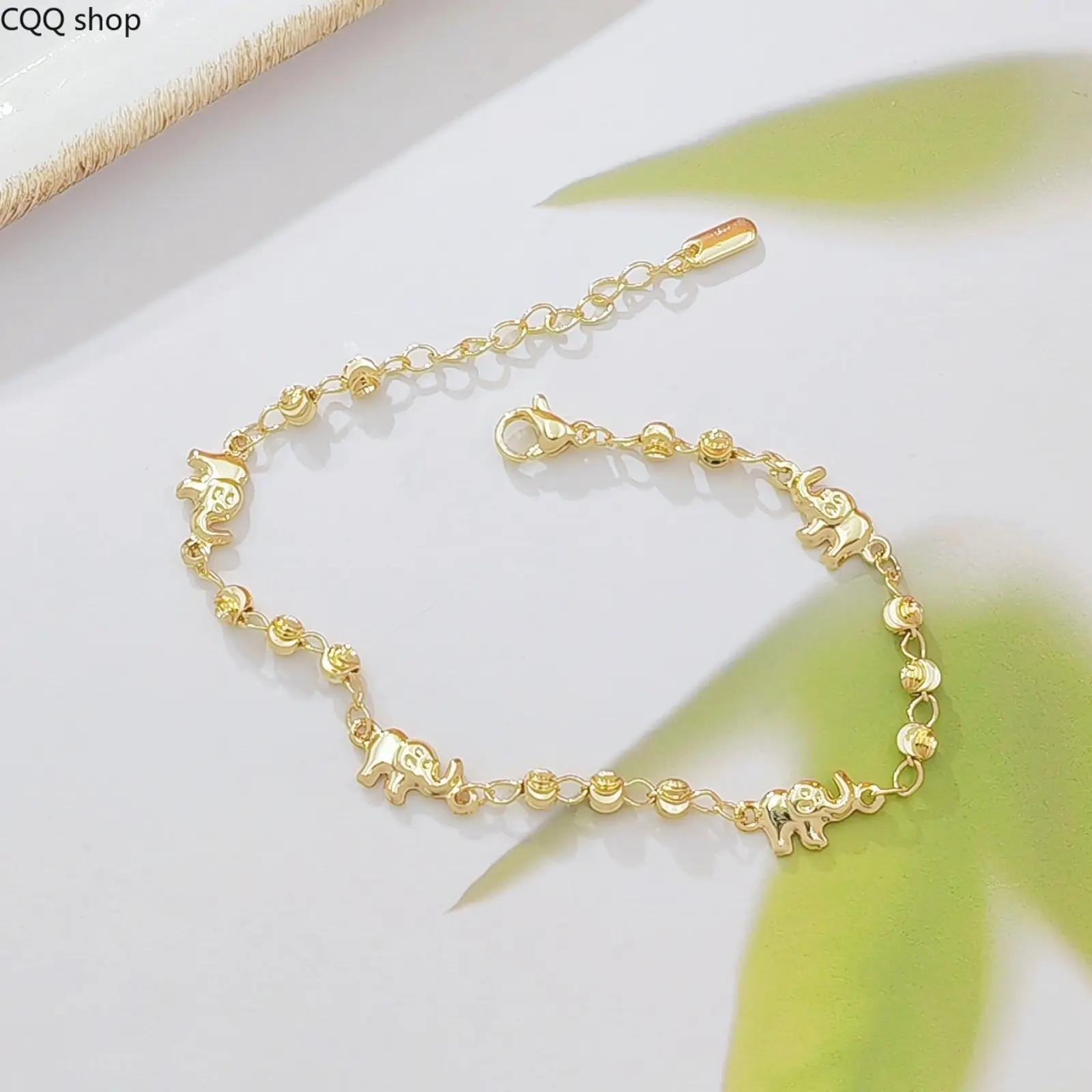 Lucky Elephant Gold Bracelet, stylish bead spliced design. Elegant premium hand jewelry, versatile accessory for women's daily wear and all occasions