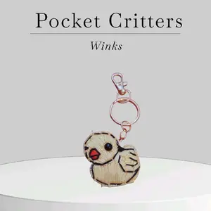 Pocket Critters Winks Adorable Embroidered Keychain with Unique Winking Design Perfect for Bags and Keys