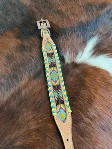 Genuine leather dog collar with teal, white, yellow and burgundy southwest beaded inlay design, a rawhide wrapped edge