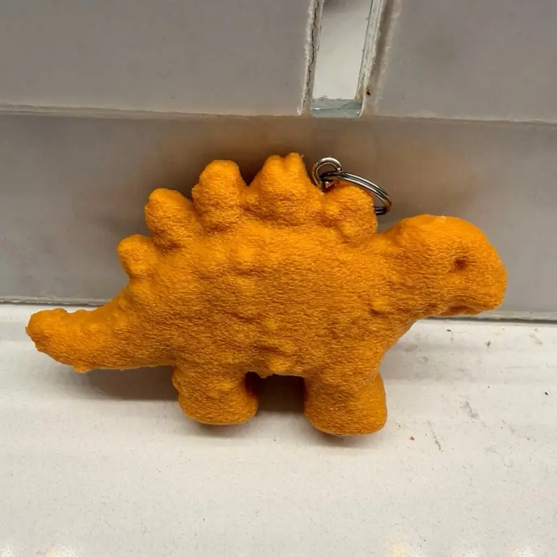 Chicken Nugget Keychain Dino Nuggie Stegasaurus Unique Plastic Gift for Foodies, Fun Novelty for Cars, Home, Office, and Holidays