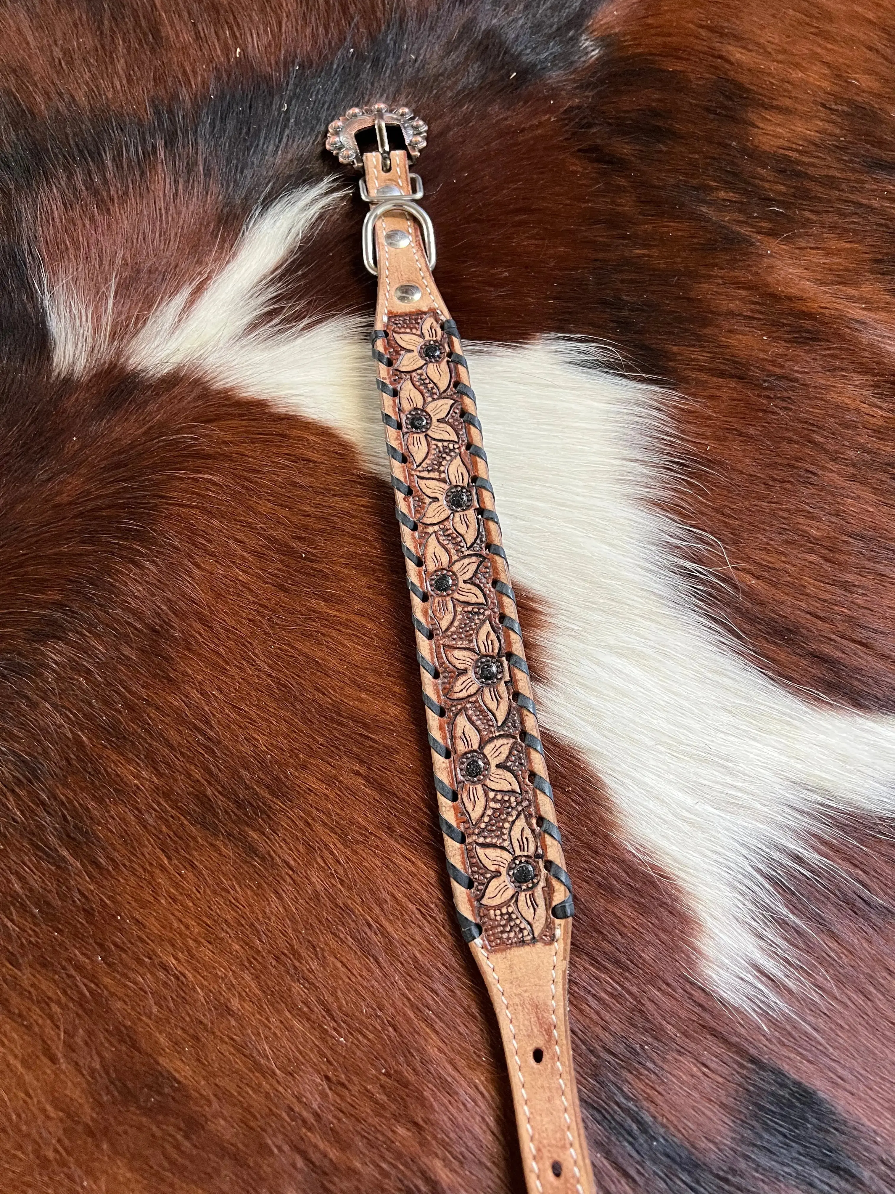 Genuine leather dog collar with black rawhide. Genuine leather dog collar with black rawhide.
