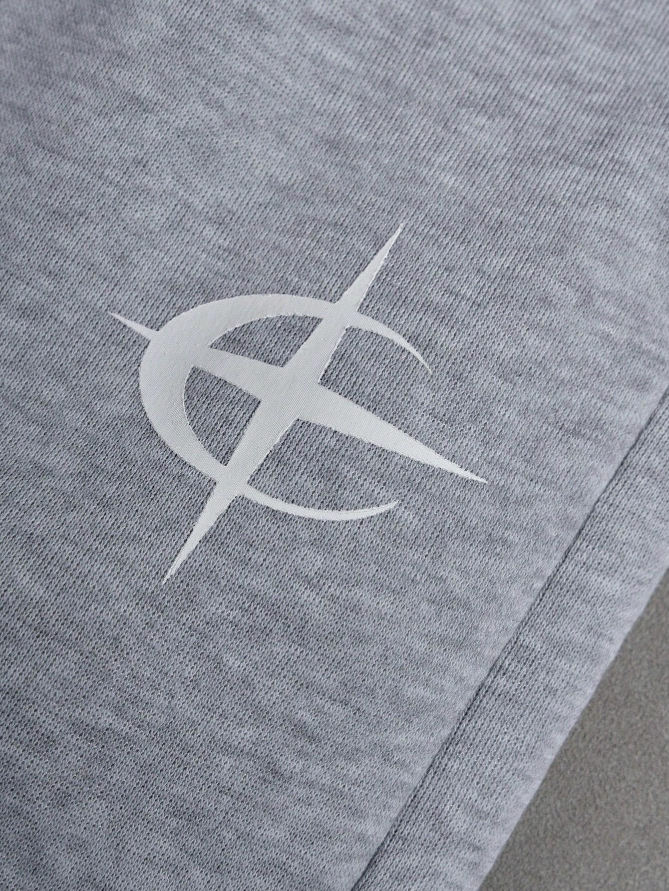 Gray sweatpants with embroidered logo, Y2K American street casual joggers, loose casual knitted sports pants featuring a drawstring and faux two-piece design with contrasting double waistband, perfect for everyday wear and trendy gatherings.