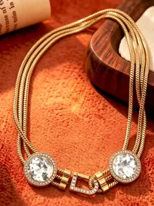 A retro yet elegant distressed gold snake bone necklace adorned with diamonds, featuring dual centerpiece stones and a D-shaped diamond clasp, suitable for various occasions such as evening parties, vintage outfits, and light business wear.