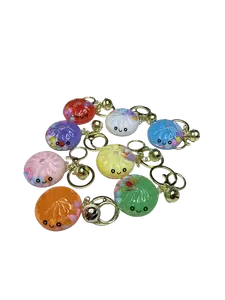 Quicksand Toy Bun Mystery Keychain by TOYTROPOLIS - Acrylic Filled Dumpling with Bell (10 Random Mystery Designs; 8 Common - 2 Rare)