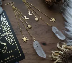 Gold Sun, Star, Moon, and Crystal earrings