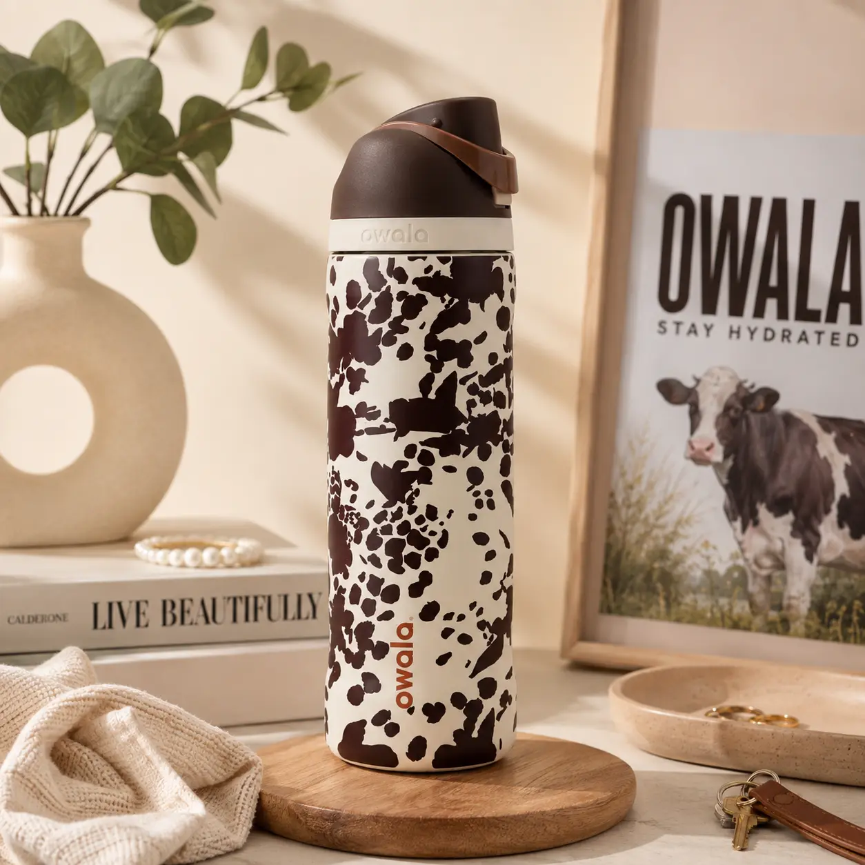Owala 32 oz FreeSip Wild at Heart Insulated Water Bottle – Brown Cow Print Stainless Steel Reusable Bottle with Straw Lid, Leak-Resistant Travel Tumbler for Gym, Work, School & Everyday Hydration