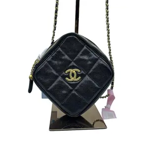 Pre-owned CHANEL HZ8 diamond patterned mini camera bag in black and gold. 70833