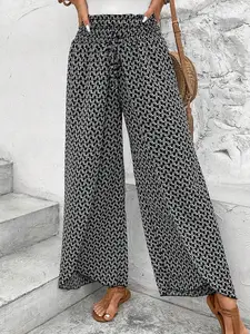 A women's floral fashion versatile wide-leg Maxi Street Fashion Skirt with side slit, suitable for summer, suitable for beach, sand, party and other occasions