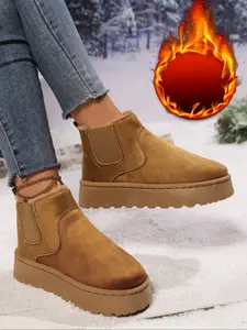 Women's winter warm boots with water-resistant design. We recommend choosing a larger size for wide feet. These boots are suitable for daily wear and outdoor activities.