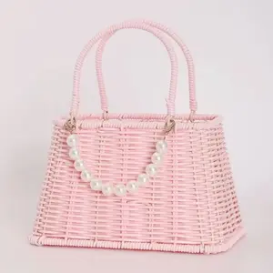 Pink Handwoven Gift Basket with Elegant Pearl Accents and Durable Woven Design