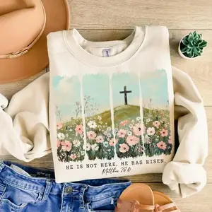 He Is Risen wildflower spring Easter sweatshirt with a boho Christian design, celebrating Jesus, faith, and the beauty of the Easter season.