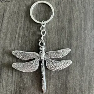 Retro Dragonfly Alloy Keychain - Whimsical Vintage Insect Bag Charm, Unisex Metal Pendant, Minimalist Stylish Decor, Funky Unique Accessories for Handbags, Backpacks, Holiday Gifts (Sports & Outdoor Accessory)