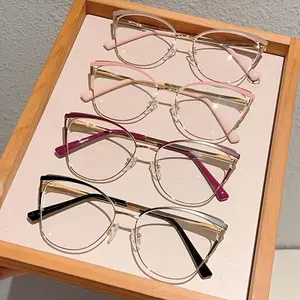 A Pair of New Women'S Cat-Eye Style Non-Prescription Glasses with a Fashionable Lightweight Metal Frame in Stylish Retro Pink.-G