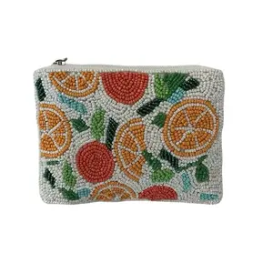 Handmade Coin Beaded Purse with Orange and Fruit Design on White Background
