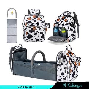 Kabaqoo's Mommy Backpack. with a mosquito net & foldable baby bed. Adjustable straps for comfort. Stow all baby essentials easily.cow.Diaper Bag summerwins