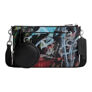 Coach x Mint+Serf Holden 25 Graffiti-Print Envelope Shoulder Bag for Women, Pebbled Leather, Black