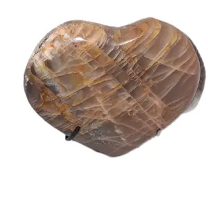 Polished Heart-Shaped Peach Moonstone Crystal Carving with Black Metal Display Stand