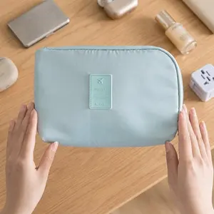 Waterproof Electronic Organizer Bag & Charging Station 2-in-1 Design. Travel Cable Organizer with Grid Lining, Shockproof Padding, Water-Resistant Zipper. Dual Compartments, Dedicated Slot, Elastic Holders. Lightweight, Scratch-Resistant, Foldable.