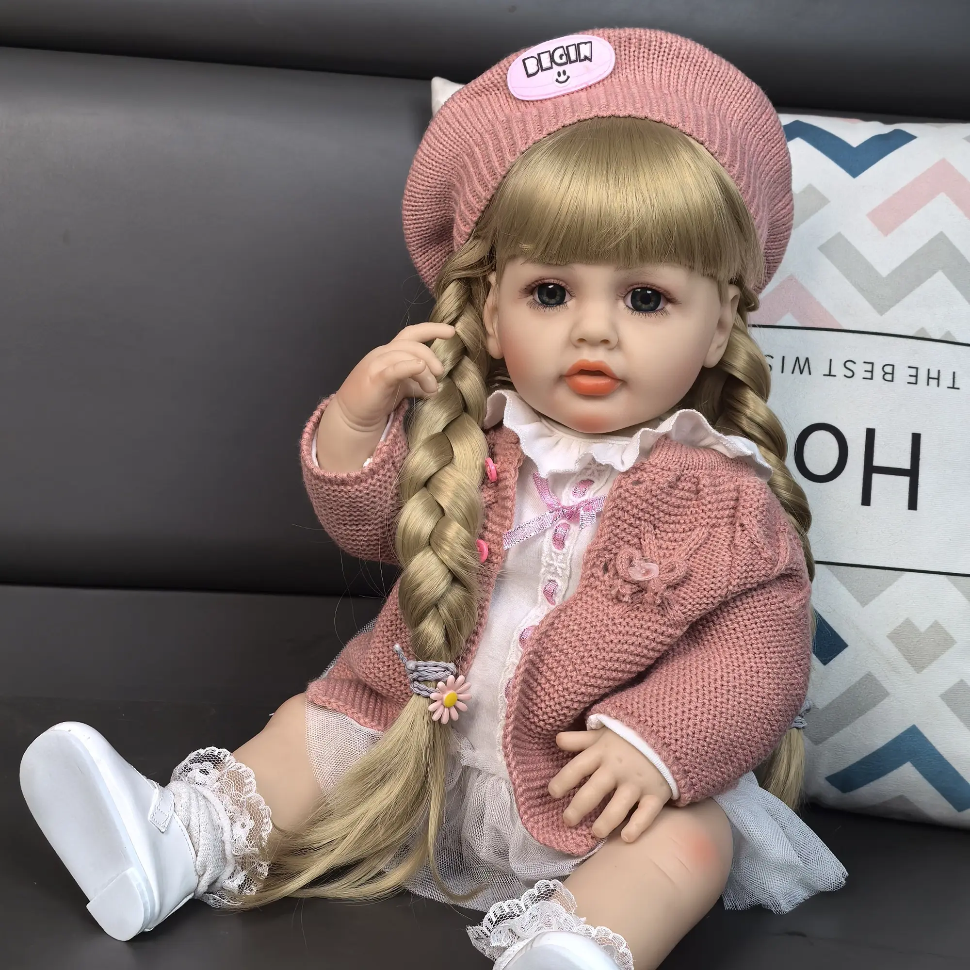 KEIUMI 22in Silicone Newborn Girl Baby Doll Betty - Gorgeous Full Body Soft Baby Doll, 2 Golden Braids, Blue Eyes, White Peter Pan Collar Dress, Dusty Pink Cardigan, Beret, Lace Socks, Leather Shoes, 2 Pink Daisy Hair Ties, Kids 3+ Birthday Christmas Gift
