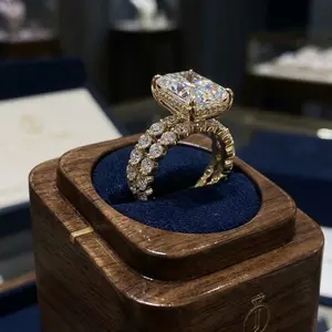 An elegant 14k gold-plated couple's ring set with Cubic Zirconia stones for women. Ideal jewelry and accessories for parties, engagements, and weddings.
