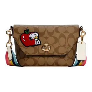 COACH x Peanuts Snoopy Karlee 23 Crossbody Flap Bag for Women, Monogram Rainbow Strap, Faux Leather, Khaki