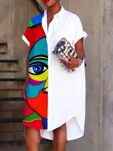 A women's geometric print contrast-colored v-neck short-sleeved loose-fitting Woven shirt dress that is casual and versatile.