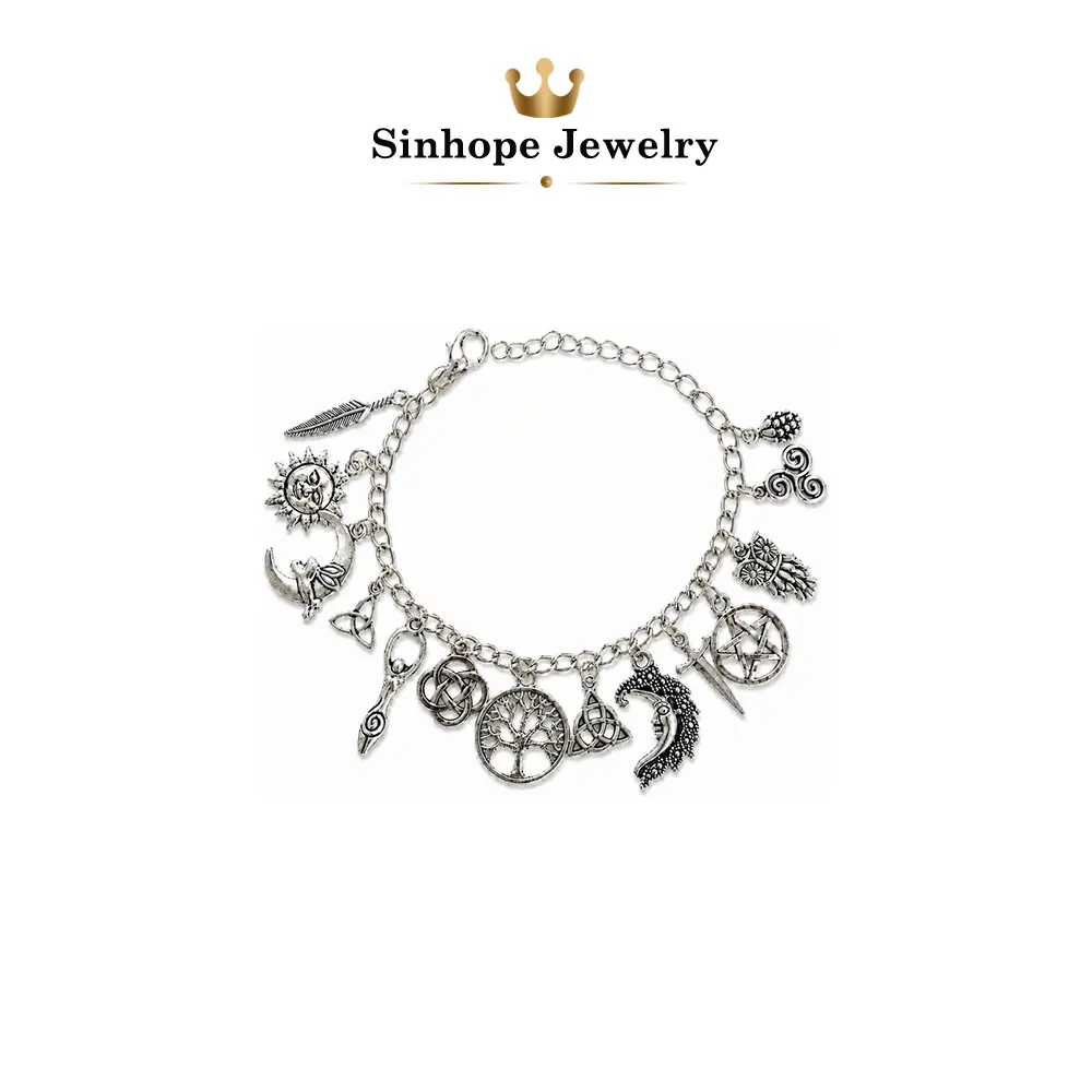 Silver-toned pagan-style bracelet jewelry, vintage witchcraft-style bracelet, featuring pendants of the moon, sun, tree of life, owl, and pentagram, a beautiful gift for friends or mothers