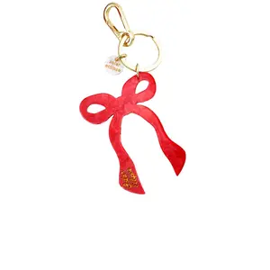 Solar Eclipse Hand-Painted Coquette Bow Bag Charm + Keychain in Red