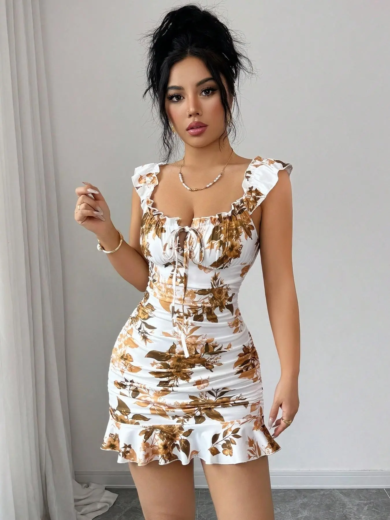 floral bodycon mini dress Print With Spaghetti Straps The high neckline adds a touch of refinement to balance the mini length Windsor Frankie Floral Beaded Bodycon
