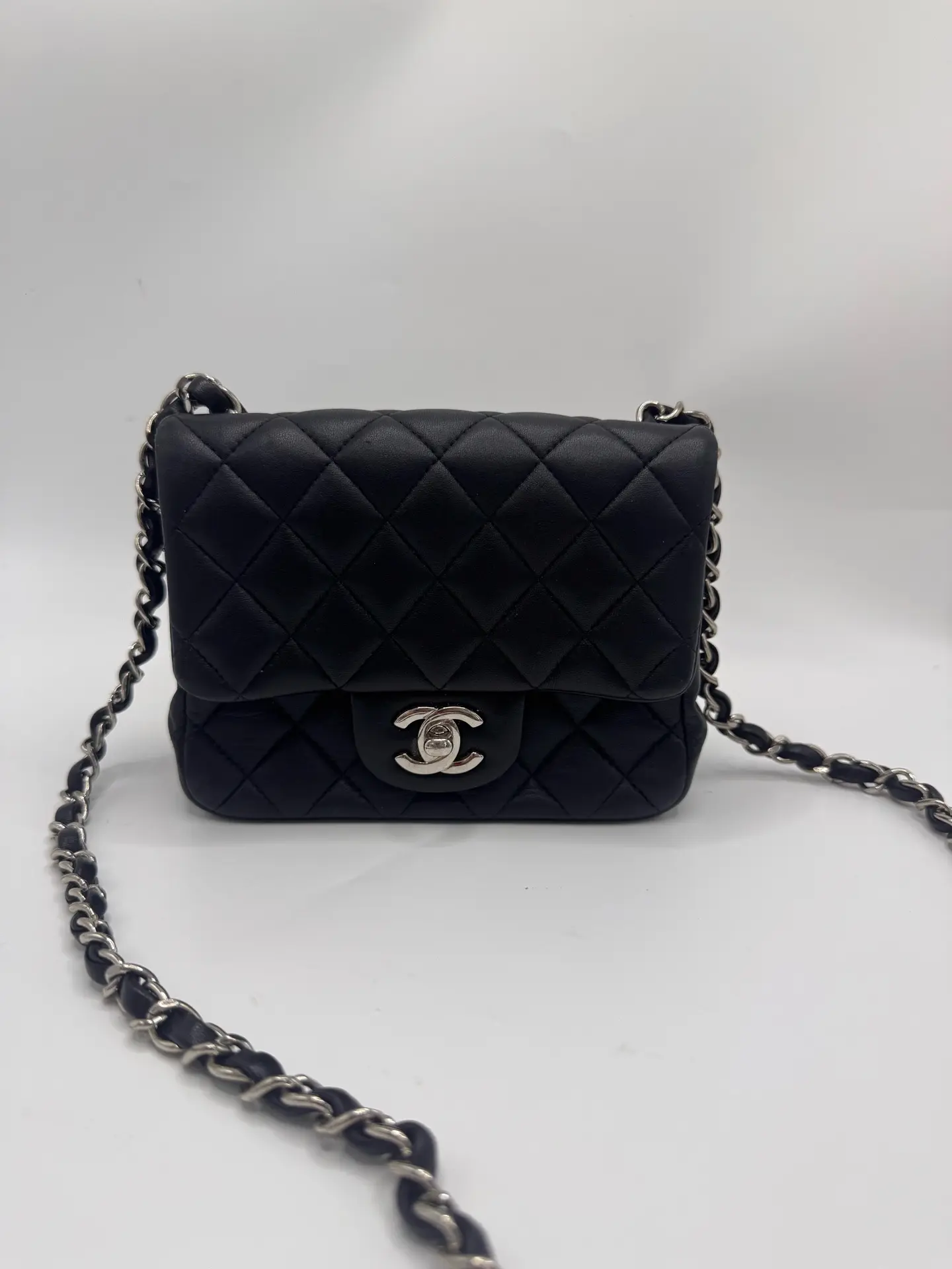 Pre-owned CHANEL Classic Flap Square Bag in Black Lambskin Leather with Silver Hardware, 26 Series, Normal Signs of Wear, Clean Interior.