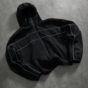 Black windproof hooded jacket with multi reflective stripe details, front zip closure, elastic cuffs, drawstring hood, oversized cropped fit, lightweight woven street athletic outerwear Menswear Coats