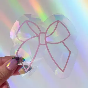 Pink Bow Rainbow Maker - Transparent Prismatic Film with Light Pink Bow Graphic Overlay - 3.75 x 4 Inches - Hand-Made Decal for Sunny Windows