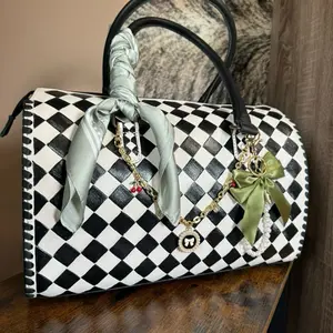 Large Checkered Speedy Bag with Elegant Bow and Charm Accents for Stylish Everyday Use