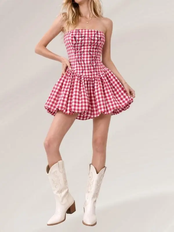 Strapless mini dress with a fitted, structured corset-style bodice that transitions into a flared, high-waisted bubble skirt.