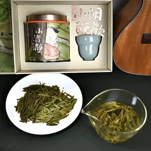 Longjing tea from China, complimentary Chinese porcelain cup