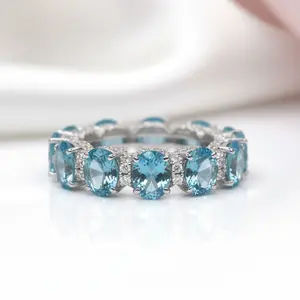 Luxurious Aquamarine Blue Simulated Diamond Option Wedding Band