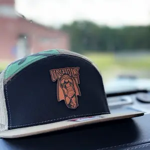Unholy Camo 7 Panel Hat with Unique Logo Design and Camouflage Pattern