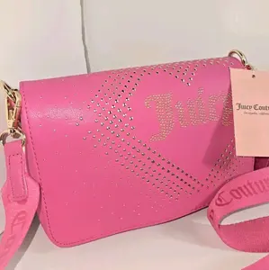 Juicy Couture Pink Crossbody Bag with Gold Studs and Adjustable Strap for Everyday Use