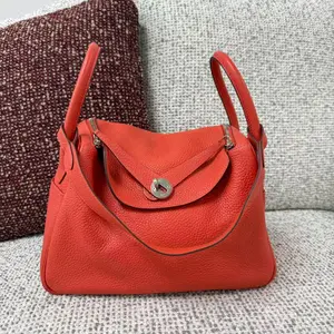 Pre-owned HERMÈS leather Shoulder Bags HERMES PARIS Hermes Lindy 30 Togo Orange