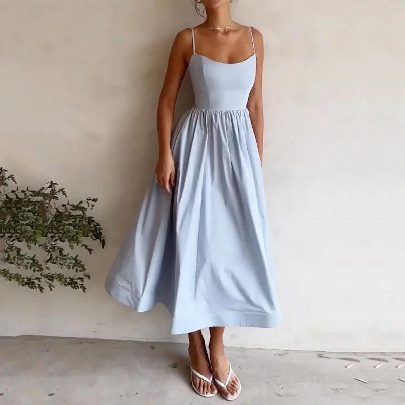 Lady's white simple and fashionable strapless dress - square neckline, fitted waist, sexy V-neck with waist crease and flowing long skirt with big waves. Trendy everyday brunch date attire for 2025.