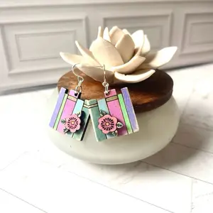 book earrings