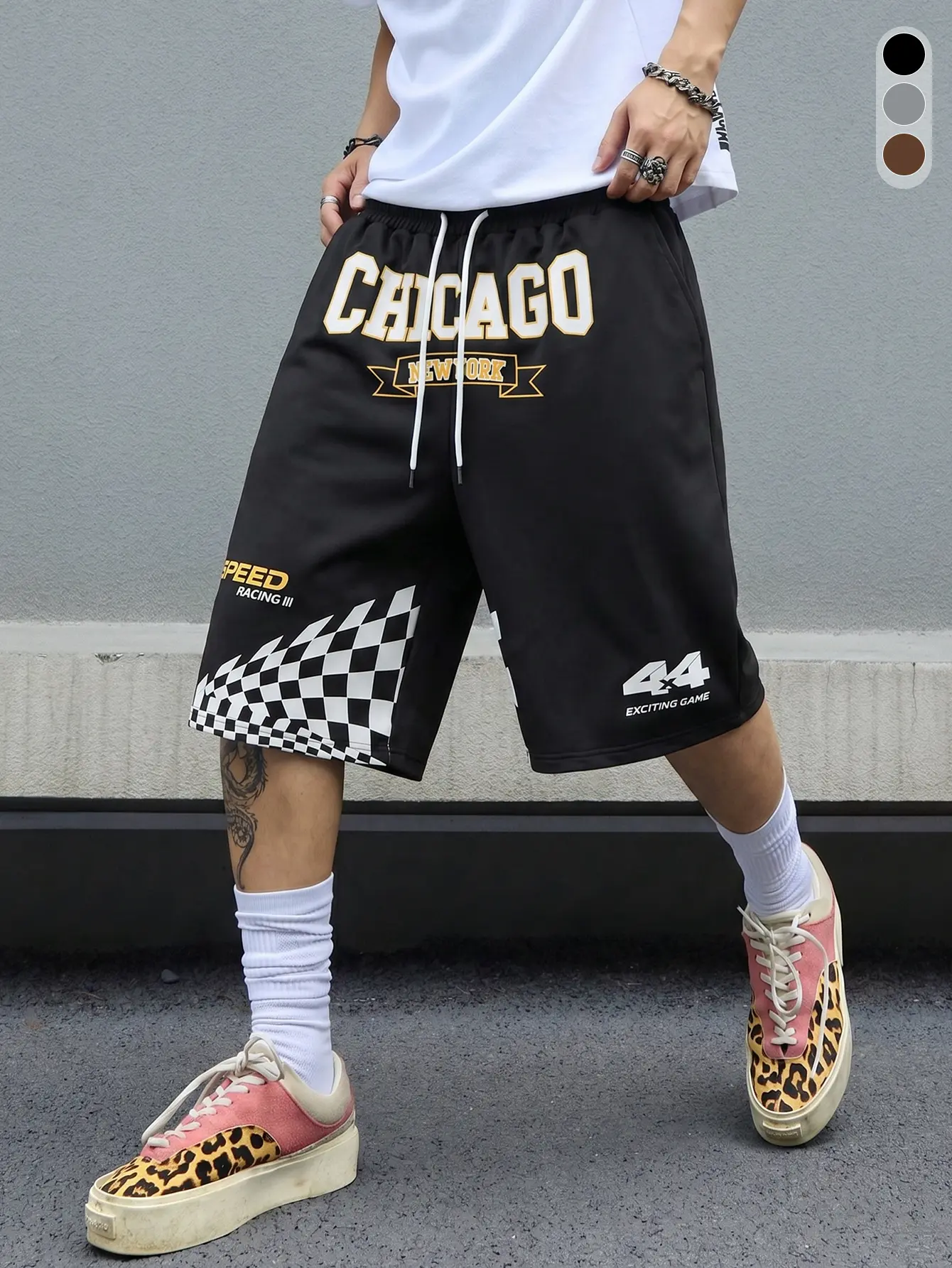 Men’s urban racing shorts — loose mid-thigh fit with speed and checkered design; perfect for street style, skateboarding, and everyday wear. Breathable fabric suitable for the gym, everyday use, and the beach; versatile.