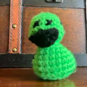 Green crochet rubber ducky