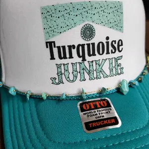Turquoise Junky DTF Trucker Hat with Turquoise hat chain.