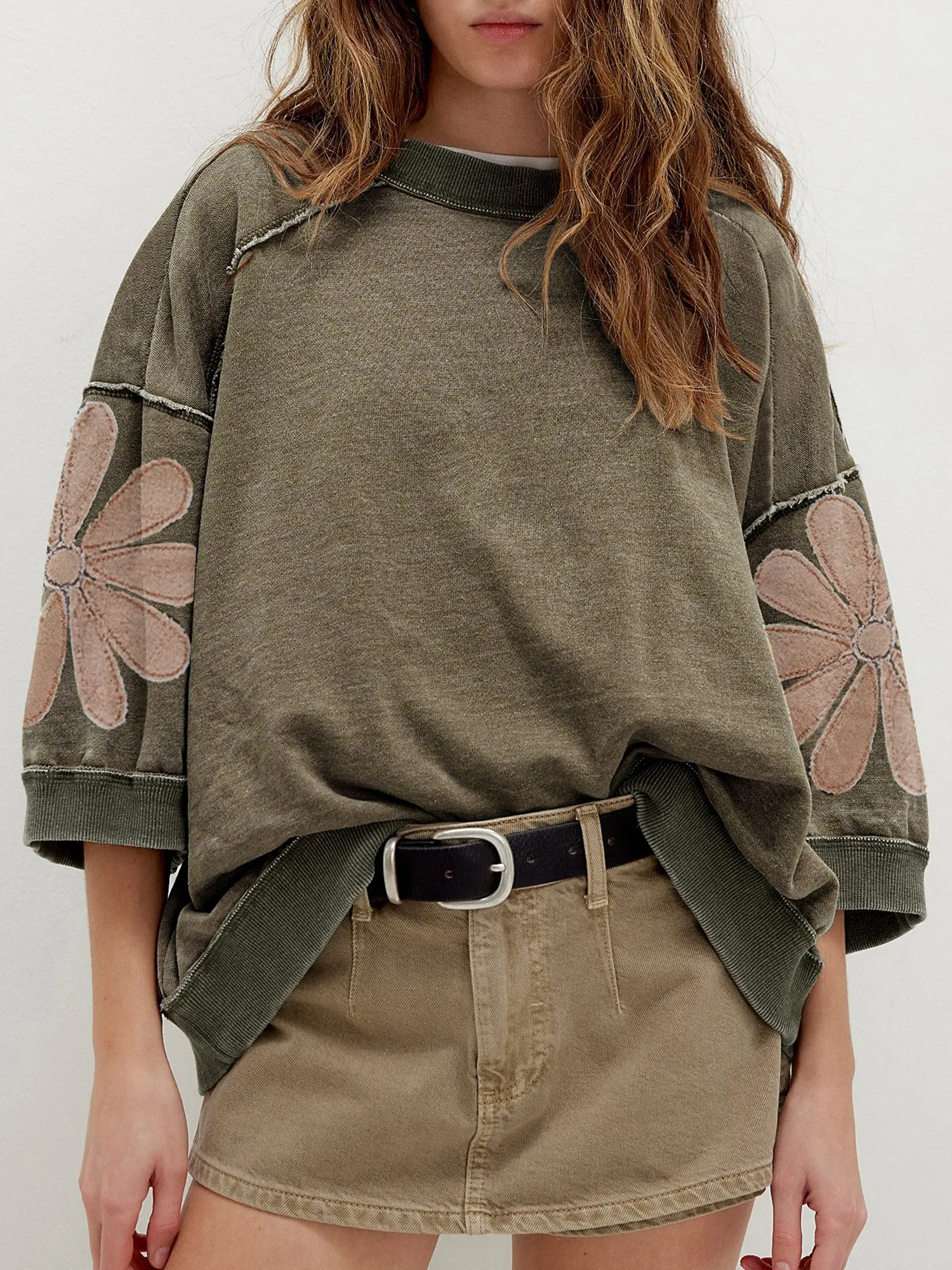 Mineral Wash Raw Seam Patchwork Flower Patched 3/4 Sleeve Oversize Top, Patchwork Flower Accents add a Whimsical and Colorful Floral Touch.